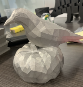 3D printed bird on a pumpkin